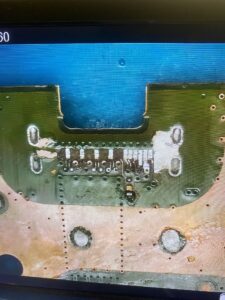 Repairs PlayStation 5 HDMI port with turn traces